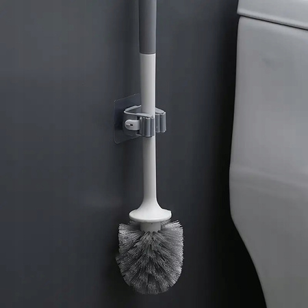 ŚCIENNY UCHWYT WIESZAK SAMOPRZYLEPNY NA MOPY MIOTŁY SZCZOTKI NARZĘDZIA